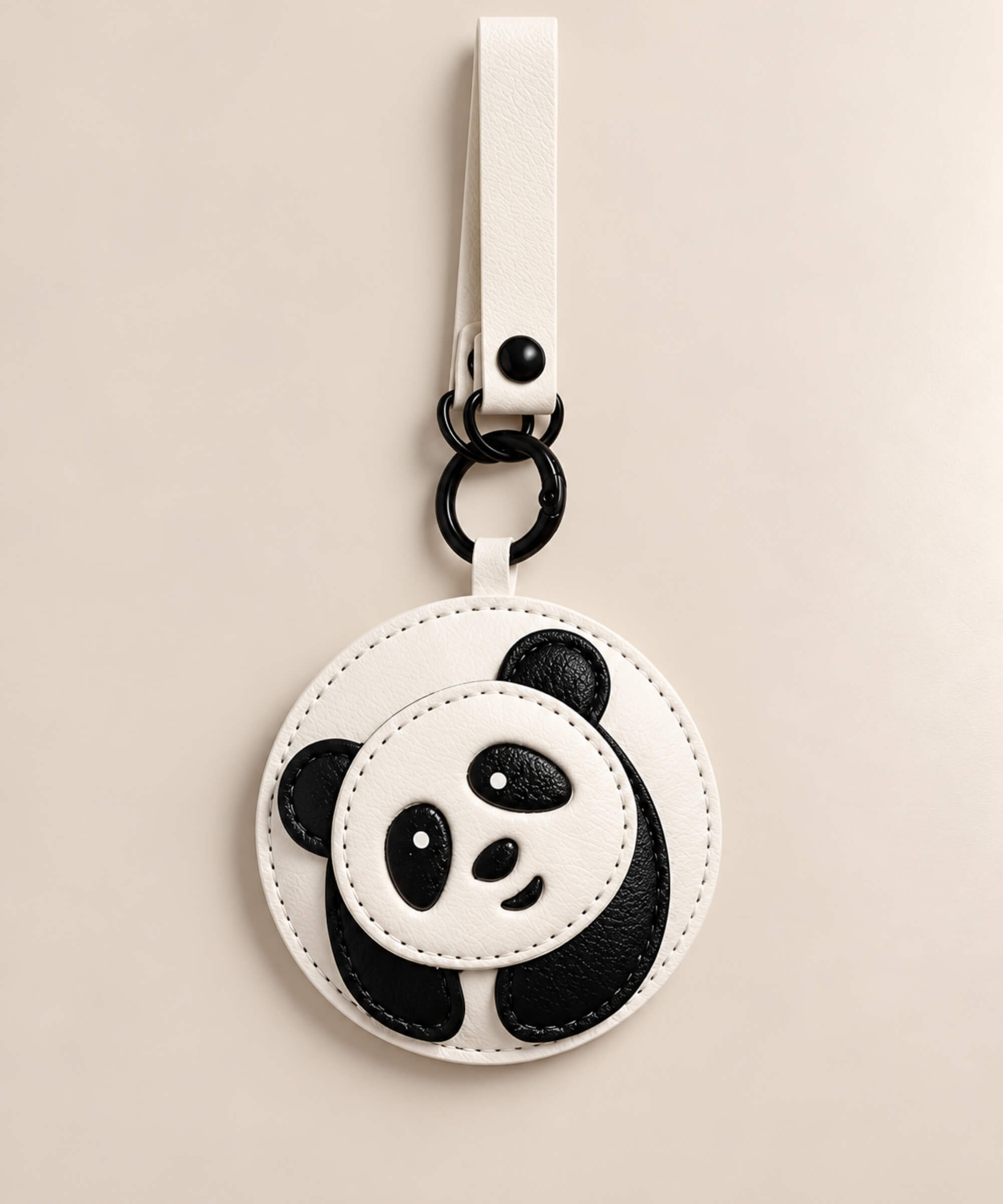 Round Panda PU leather bag charm keychain with layered black and white details